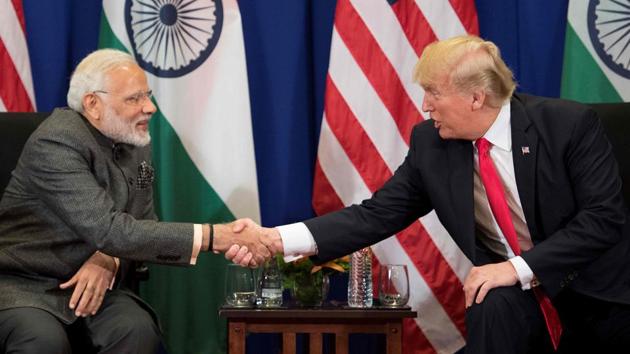 Prime Minister Narendra Modi shakes hands with US President Donald Trump during a bilateral meeting on the sideline of the 31st Association of Southeast Asian Nations (ASEAN) Summit in Manila on November 13. The transformation of the ties between two countries will facilitate India’s rise.(AFP File Photo)