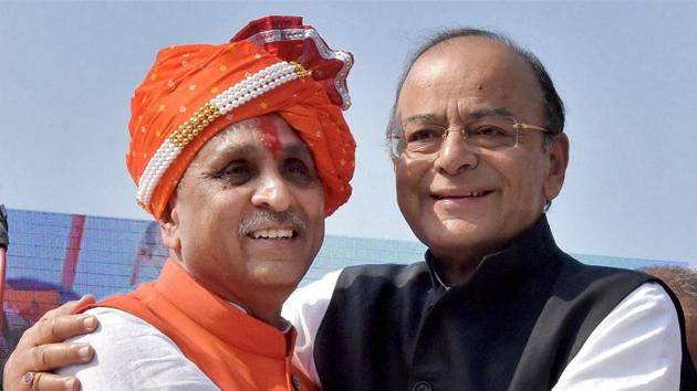 Gujarat chief minister Vijay Rupani greets Union finance minister Arun Jaitley during a public meeting for the filing of nomination papers for the state assembly elections, in Rajkot on Monday. (PTI Photo) Gujarat chief minister Vijay Rupani greets Union finance minister Arun Jaitley during a public meeting for the filing of nomination papers for the state assembly elections, in Rajkot on Monday. (PTI Photo)