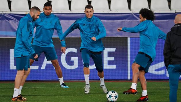 Real Madrid's Portuguese forward Cristiano Ronaldo (C) takes part in a training session at the GSP Stadium in the Cypriot capital Nicosia, on Monday. (AFP) Real Madrid's Portuguese forward Cristiano Ronaldo (C) takes part in a training session at the GSP Stadium in the Cypriot capital Nicosia, on Monday. (AFP)