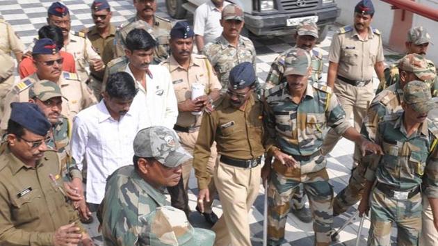 Two of the accused in the Kopardi case being brought to court earlier during the trial. (HT Photo) Two of the accused in the Kopardi case being brought to court earlier during the trial. (HT Photo)