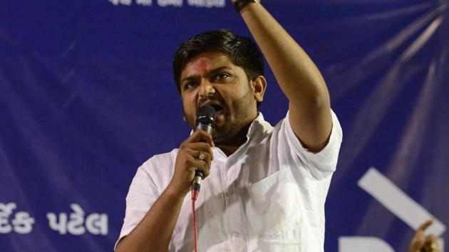 Hardik Patel, leader of Patidar Anamat Andolan Samiti (PAAS), addresses a rally during the 'Adhikar Sammelan' at Mansa in Gujarat.(AFP Photo) Hardik Patel, leader of Patidar Anamat Andolan Samiti (PAAS), addresses a rally during the 'Adhikar Sammelan' at Mansa in Gujarat.(AFP Photo)