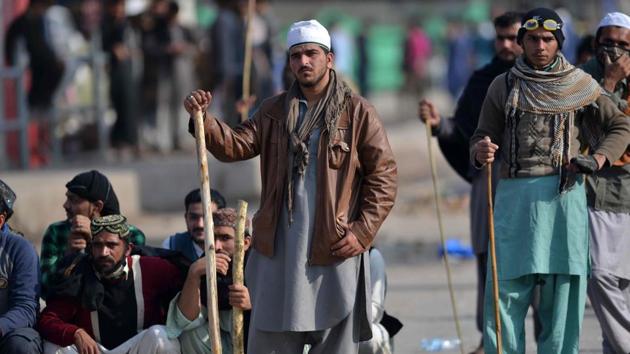 Activists from the Tehrik-e-Labaik Pakistan religious group block a street during a protest in Islamabad on November 18, 2017. Roughly 2,000 protesters are demanding the resignation of Pakistan's law minister over a hastily abandoned amendment to the oath election candidates must swear, a change the demonstrators have linked to blasphemy. (AFP) Activists from the Tehrik-e-Labaik Pakistan religious group block a street during a protest in Islamabad on November 18, 2017. Roughly 2,000 protesters are demanding the resignation of Pakistan's law minister over a hastily abandoned amendment to the oath election candidates must swear, a change the demonstrators have linked to blasphemy. (AFP)
