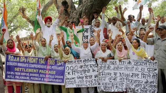 Pakistan-occupied Kashmir refugees shout slogans during a protest for their various demands in Jammu on Saturday. (PTI File Photo) Pakistan-occupied Kashmir refugees shout slogans during a protest for their various demands in Jammu on Saturday. (PTI File Photo)