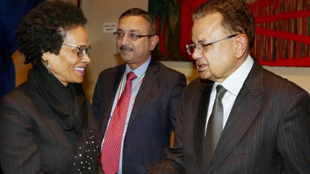 Justice Dalveer Bhandari (right) is greeted during a reception organised in his honour at the United Nations in New York on Monday.(PTI)