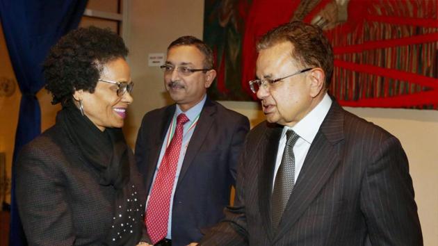 India's Justice Dalveer Bhandari being greeted during a reception organised in his honour at the United Nations in New York on Monday.(PTI Photo)