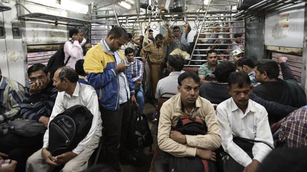 Passengers travelling from S P Marg Station to Daya Basti on the Ring Railway in New Delhi. S P Marg is one of three stations on the route without a booking office. In February 2016, then railway minister Suresh Prabhu’s announcement of the railway system’s revival owing to the severe stress the capital was under from rising pollution brought joy to many commuters. Nothing much has changed since as the system continues to decay. (Vipin Kumar / HT Photo) 