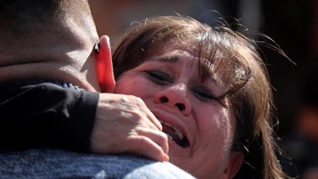 A mother and son embrace as patrol agents open the gate to allow selected families to meet along the US-Mexico border. The Border Angels group takes meeting requests from families and forwards the names to the State Department, which conducts checks and makes the final decision. “While some people want to build walls, we want to open doors”, Morones said. (Mike Blake / REUTERS) A mother and son embrace as patrol agents open the gate to allow selected families to meet along the US-Mexico border. The Border Angels group takes meeting requests from families and forwards the names to the State Department, which conducts checks and makes the final decision. “While some people want to build walls, we want to open doors”, Morones said. (Mike Blake / REUTERS)