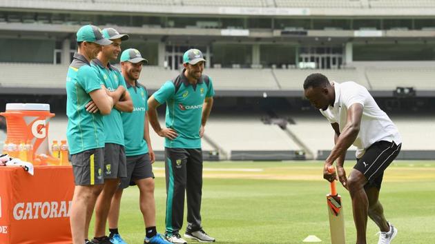 Usain Bolt gave tips to the Australian batsmen while running, with Peter Handscomb calling the tips useful. (Getty Images for Gatorade) Usain Bolt gave tips to the Australian batsmen while running, with Peter Handscomb calling the tips useful. (Getty Images for Gatorade)