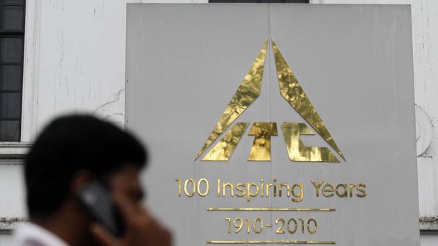 A man talks on his mobile phone as he walks past an ITC office building in Kolkata September 4, 2012. (REUTERS File) A man talks on his mobile phone as he walks past an ITC office building in Kolkata September 4, 2012. (REUTERS File)