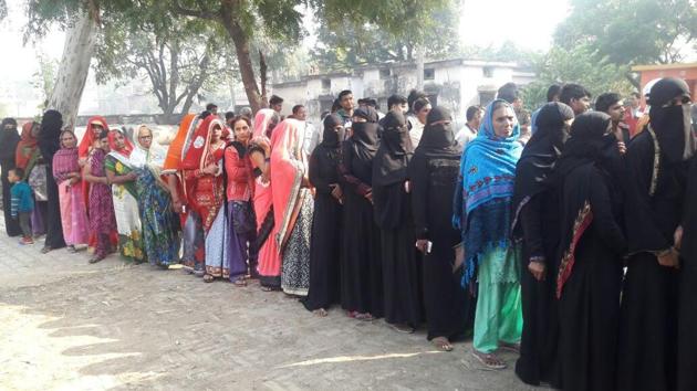Voting process on in Pratapgarh, Uttar Pradesh, on Wednesday.(HT Photo)