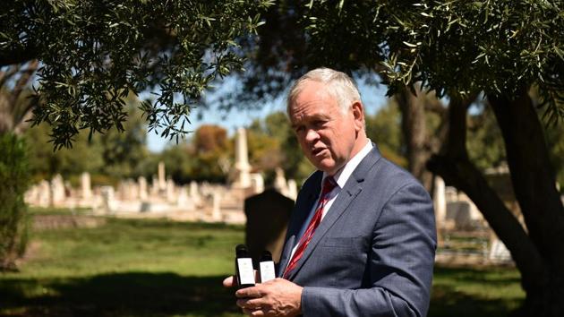 “Trying to sell death is very hard, no-one wants to buy it,” Adelaide Cemeteries Authority chief executive Robert Pitt said as olive trees rustled above ageing headstones. “However, if we’re selling olive oil or selling an experience... (it’s) where the real value of coming to a cemetery is. And there’s definitely a sense of place here. There’s a sense of reverence and a sense of history.” (Peter Parks / AFP) “Trying to sell death is very hard, no-one wants to buy it,” Adelaide Cemeteries Authority chief executive Robert Pitt said as olive trees rustled above ageing headstones. “However, if we’re selling olive oil or selling an experience... (it’s) where the real value of coming to a cemetery is. And there’s definitely a sense of place here. There’s a sense of reverence and a sense of history.” (Peter Parks / AFP)