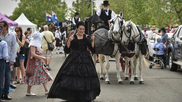 A woman in Victorian clothing leads a horse-drawn hearse before a parade commemorating the 150th anniversary of Rookwood. This “necropolis”, the final resting place for more than a million people, has drawn crowds by hosting open days, annual sculpture walks and even bike races. Its recent commemoration featured live jazz music, grave-digging demonstrations and face-painting for children. (Peter Parks / AFP) A woman in Victorian clothing leads a horse-drawn hearse before a parade commemorating the 150th anniversary of Rookwood. This “necropolis”, the final resting place for more than a million people, has drawn crowds by hosting open days, annual sculpture walks and even bike races. Its recent commemoration featured live jazz music, grave-digging demonstrations and face-painting for children. (Peter Parks / AFP)