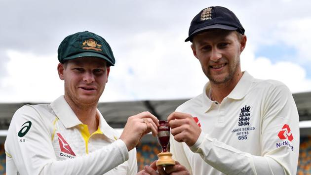 Australia skipper Steve Smith (L) and England captain Joe Root hold a replica Ashes Urn in Brisbane on Wednesday. (AFP)