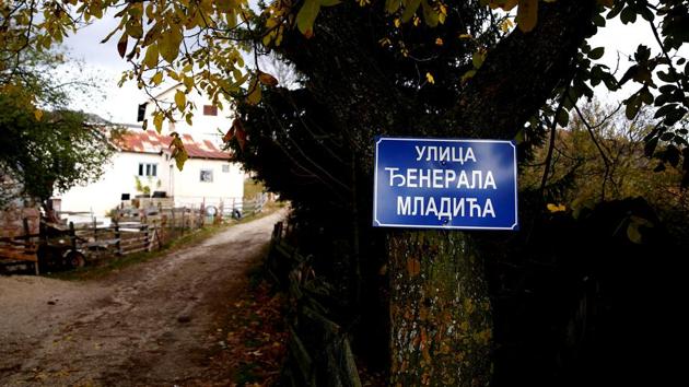 A sign reading "General Mladic Street" hangs on a tree in his home village Bozanovici where barely two dozen people --mostly his blood relatives-- still remain in Bosnia and Herzegovina. Mladic was captured in 2011 after 16 years on the run and is still revered in the Serb sector of Bosnia as a defender of the nation during the war that killed more than 100,000 people. (Dado Ruvic / REUTERS) A sign reading "General Mladic Street" hangs on a tree in his home village Bozanovici where barely two dozen people --mostly his blood relatives-- still remain in Bosnia and Herzegovina. Mladic was captured in 2011 after 16 years on the run and is still revered in the Serb sector of Bosnia as a defender of the nation during the war that killed more than 100,000 people. (Dado Ruvic / REUTERS)