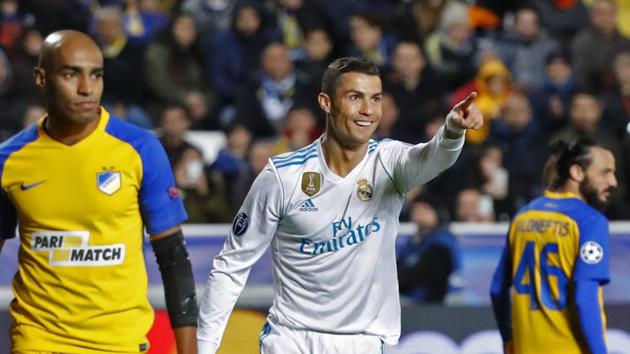 Cristiano Ronaldo scored a brace as Real Madrid crushed APOEL Nicosia 6-0 to enter the last 16 but Liverpool’s progress had to wait after a 3-3 draw against Sevilla. (AFP) Cristiano Ronaldo scored a brace as Real Madrid crushed APOEL Nicosia 6-0 to enter the last 16 but Liverpool’s progress had to wait after a 3-3 draw against Sevilla. (AFP)