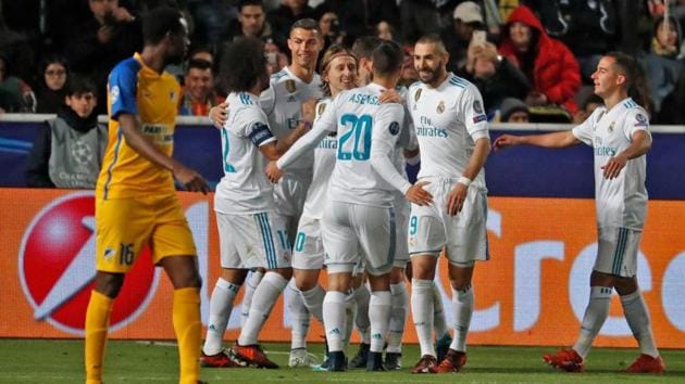 Real Madrid's players celebrate a goal during the UEFA Champions League Group H match against APOEL Nicosia on Tuesday. (AFP) Real Madrid's players celebrate a goal during the UEFA Champions League Group H match against APOEL Nicosia on Tuesday. (AFP)