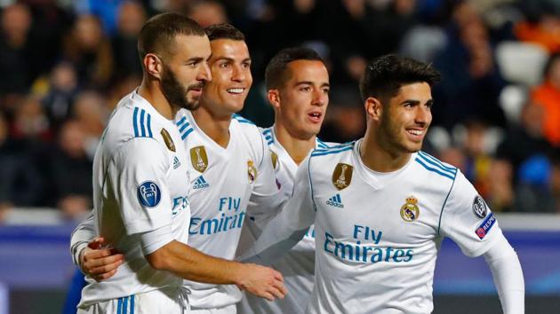Real Madrid thrashed APOEL 6-0 in the Champions League on Tuesday, but will finish behind Tottenham Hotspur in Group H after the latter defeated Borussia Dortmund 2-1. (AFP)
