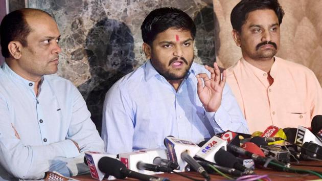 Patidar leader Hardik Patel with Dinesh Bhambaniya (left) addresses a press conference in Ahmedabad on Wednesday. (PTI) Patidar leader Hardik Patel with Dinesh Bhambaniya (left) addresses a press conference in Ahmedabad on Wednesday. (PTI)