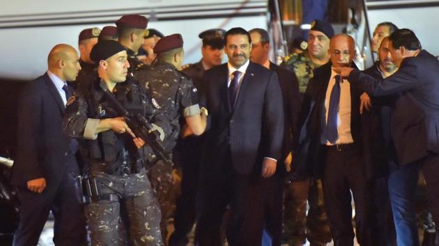Lebanese Prime Minister Saad Hariri (C) arrives at Beirut International Airport on November 21, 2017. Lebanon's prime minister Saad Hariri returned to his home country late Tuesday. (AFP Photo) Lebanese Prime Minister Saad Hariri (C) arrives at Beirut International Airport on November 21, 2017. Lebanon's prime minister Saad Hariri returned to his home country late Tuesday. (AFP Photo)