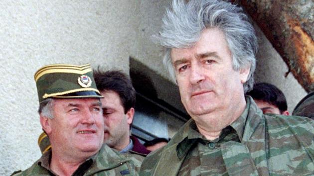 Bosnian Serb wartime leader Radovan Karadzic (R) and general Ratko Mladic in Banja Luka in April, 1995. Dubbed “The Butcher of Bosnia,” Mladic’s trial is the last before the ICTY, and the judgement --on one of the highest profile war crimes suspects in Europe since Nuremberg-- has been long awaited by tens of thousands of victims across the bitterly divided region. (Ranko Cukovic / REUTERS) Bosnian Serb wartime leader Radovan Karadzic (R) and general Ratko Mladic in Banja Luka in April, 1995. Dubbed “The Butcher of Bosnia,” Mladic’s trial is the last before the ICTY, and the judgement --on one of the highest profile war crimes suspects in Europe since Nuremberg-- has been long awaited by tens of thousands of victims across the bitterly divided region. (Ranko Cukovic / REUTERS)