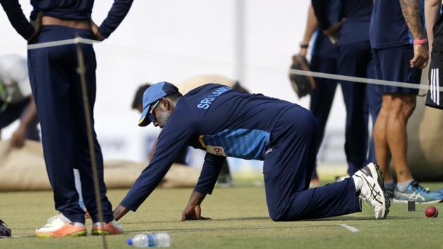 Sri Lanka cricket player Angelo Mathews inspects the pitch during practice. (AP) Sri Lanka cricket player Angelo Mathews inspects the pitch during practice. (AP)