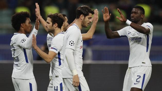 Chelsea footballers celebrate after scoring a goal against Qarabag in the UEFA Champions League. (AP)