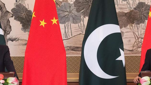 Flags of China and Pakistan during a press conference in Beijing on September 8.(AFP File Photo)