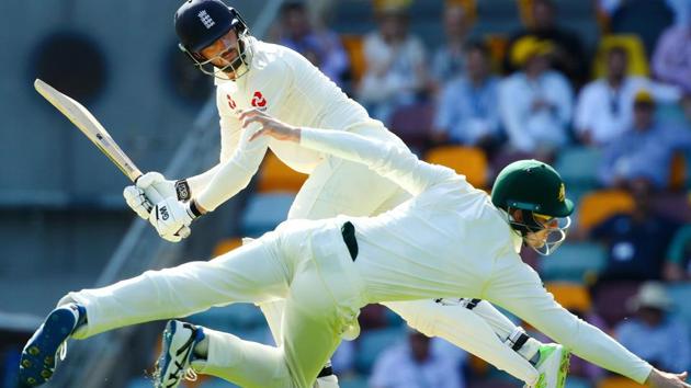 Australia cricket team's Cameron Bancroft (R) dives in vain as England cricket team's James Vince (L) flicks one to the boundary on Day 1 of the first Test of Ashes 2017 series in Brisbane on Thursday.(AFP) Australia cricket team's Cameron Bancroft (R) dives in vain as England cricket team's James Vince (L) flicks one to the boundary on Day 1 of the first Test of Ashes 2017 series in Brisbane on Thursday.(AFP)