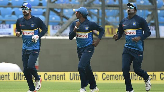 Sri Lanka's cricket team captain Dinesh Chandimal (L) runs with teammates during training. (AFP) Sri Lanka's cricket team captain Dinesh Chandimal (L) runs with teammates during training. (AFP)