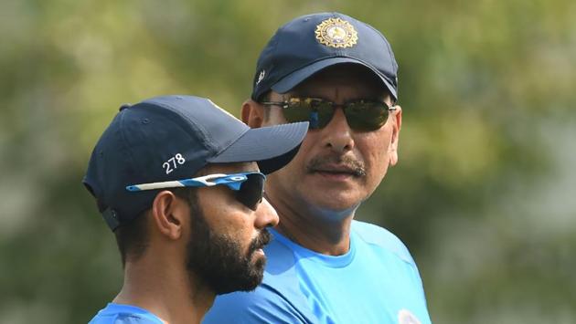 Indian cricket team coach Ravi Shastri (R) chats with Ajinkya Rahane during the training session. (AFP) Indian cricket team coach Ravi Shastri (R) chats with Ajinkya Rahane during the training session. (AFP)