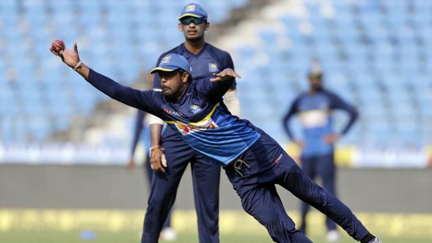 Sri Lanka cricket player Dilruwan Perera catches a ball during practice. (AP) Sri Lanka cricket player Dilruwan Perera catches a ball during practice. (AP)