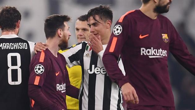 Juventus' Paulo Dybala (C) speaks with FC Barcelona’s Lionel Messi at the end of the match. (AFP) Juventus' Paulo Dybala (C) speaks with FC Barcelona’s Lionel Messi at the end of the match. (AFP)