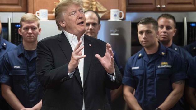 US President Donald Trump visits members of the US Coast Guard at Station Lake Worth Inlet in Riviera Beach, Florida on Thanksgiving day November 23, 2017. (AFP) US President Donald Trump visits members of the US Coast Guard at Station Lake Worth Inlet in Riviera Beach, Florida on Thanksgiving day November 23, 2017. (AFP)