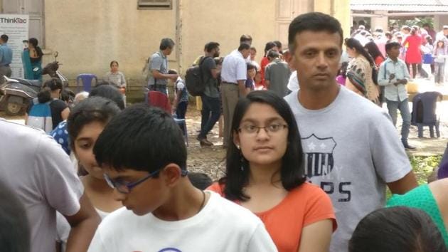 Rahul Dravid was praised by social media users for his humility after a picture of him lining up at a science fair went viral.(Twitter)