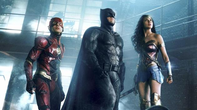 This image released by Warner Bros. Pictures shows Ezra Miller, from left, Ben Affleck and Gal Gadot in a scene from Justice League.(AP) This image released by Warner Bros. Pictures shows Ezra Miller, from left, Ben Affleck and Gal Gadot in a scene from Justice League.(AP)