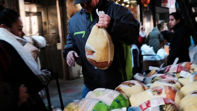 New Yorkers received special Thanksgiving grocery packages, including a turkey, at the Reaching Out Community Services food pantry in days leading to Thanksgiving. The popular Brooklyn food pantry feeds over 4,000 New Yorkers per month while offering a host of other services for those in need. (Spencer Platt / Getty Images / AFP) New Yorkers received special Thanksgiving grocery packages, including a turkey, at the Reaching Out Community Services food pantry in days leading to Thanksgiving. The popular Brooklyn food pantry feeds over 4,000 New Yorkers per month while offering a host of other services for those in need. (Spencer Platt / Getty Images / AFP)