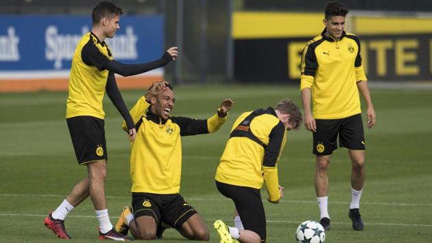 Borussia Dortmund footballers practice ahead of their Bundesliga match against Schalke 04.(AP)