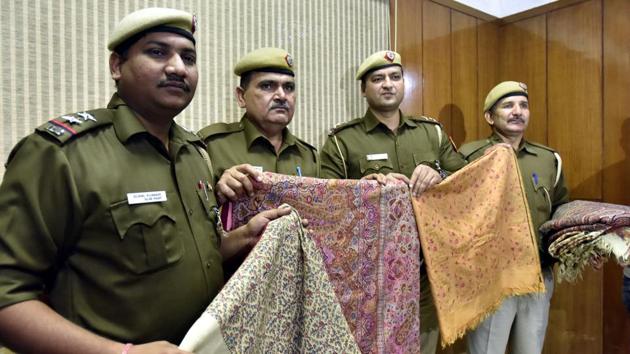 Delhi Police display some of the stolen antique Pashmina shawls that were stolen from the Craft’s Museum in November. Police recovered the shawls after arresting three men, one of whom had spent considerable time in the museum.(Sonu Mehta/HT Photo) Delhi Police display some of the stolen antique Pashmina shawls that were stolen from the Craft’s Museum in November. Police recovered the shawls after arresting three men, one of whom had spent considerable time in the museum.(Sonu Mehta/HT Photo)