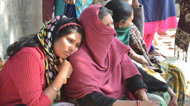 The wait is harrowing for the families of trapped firemen Sukhdev, Manohar Lal and Manpreet Singh. “We have heard of miracles. My father is a fighter and cannot go this way,” Lal’s 21-year-old daughter Tamanna (left) said. With her mother and brother, she has been keeping vigil since Monday. They spend the nights at the Civil hospital and return to the site every morning. (Gurpreet Singh / HT Photo) 