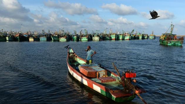 An Indian fisherman stands on his boat after a night of working at the sea in Chennai. November 21 is celebrated as World Fisheries Day. (Arun Sankar / AFP) An Indian fisherman stands on his boat after a night of working at the sea in Chennai. November 21 is celebrated as World Fisheries Day. (Arun Sankar / AFP)