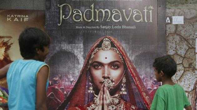 Boys look at a poster of Padmavati in Mumbai. (AP Photo) Boys look at a poster of Padmavati in Mumbai. (AP Photo)