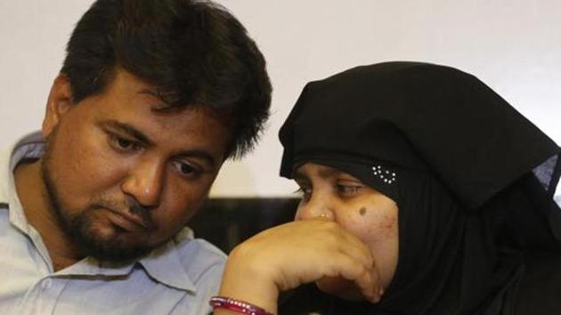 Bilkis Bano, one of the survivors of the Gujarat riot victims, with her husband Yakub Rasool (left) during a press conference in Ahmadabad on May 11, 2017. (AP File Photo) Bilkis Bano, one of the survivors of the Gujarat riot victims, with her husband Yakub Rasool (left) during a press conference in Ahmadabad on May 11, 2017. (AP File Photo)