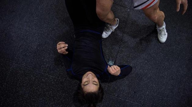 A former judoka in China’s state sports system, Miao enjoys a light moment during her training session. She switched to MMA, the formidable multi-discipline amalgam of grappling and striking typified by Ultimate Fighting Championship (UFC) stars such as Ireland’s Conor McGregor. (Chandan Khanna / AFP) A former judoka in China’s state sports system, Miao enjoys a light moment during her training session. She switched to MMA, the formidable multi-discipline amalgam of grappling and striking typified by Ultimate Fighting Championship (UFC) stars such as Ireland’s Conor McGregor. (Chandan Khanna / AFP)