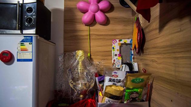 Miao‘s trophies kept wrapped in plastic share space with the her son’s toys at their home in Shanghai. The 163cm (5ft 3in) Miao switched in 2010 to Brazilian jiu-jitsu, MMA’s dominant style, before jumping this year into MMA. (Chandan Khanna / AFP) Miao‘s trophies kept wrapped in plastic share space with the her son’s toys at their home in Shanghai. The 163cm (5ft 3in) Miao switched in 2010 to Brazilian jiu-jitsu, MMA’s dominant style, before jumping this year into MMA. (Chandan Khanna / AFP)