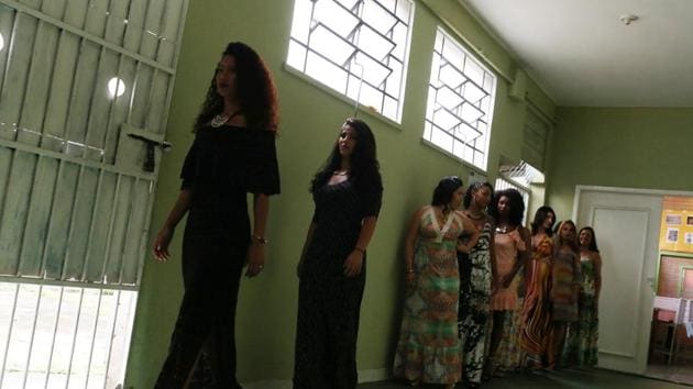 Prisoners and participants in the "TB Girl" beauty contest line up at the penitentiary in Rio de Janeiro. An NGO and a Protestant church helped organize the event, providing clothing, make-up artists and hair stylists for the last day. (Pilar Olivares / REUTERS) Prisoners and participants in the "TB Girl" beauty contest line up at the penitentiary in Rio de Janeiro. An NGO and a Protestant church helped organize the event, providing clothing, make-up artists and hair stylists for the last day. (Pilar Olivares / REUTERS)