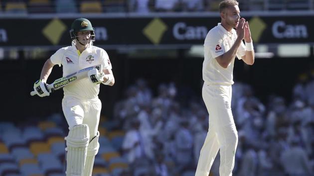 England's Stuart Broad, right, reacts as Australia's Steve Smith, left, scores runs off his bowling during the Ashes cricket test between England and Australia in Brisbane, Friday, November 24, 2017. Get full cricket score of Australia vs England 1st Test here.(AP)