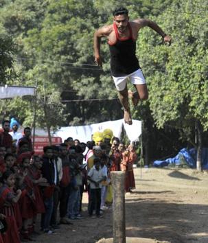 An acrobat performing at Chandigarh Carnival on Friday. (Ravi Kumar/HT)
