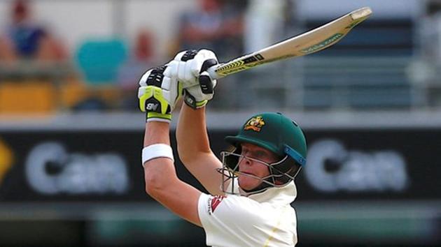 Australia cricket team captain Steve Smith hits a boundary during the third day of the first Ashes 2017-18 Test against England cricket team at The Gabba in Brisbane on Saturday. (REUTERS) Australia cricket team captain Steve Smith hits a boundary during the third day of the first Ashes 2017-18 Test against England cricket team at The Gabba in Brisbane on Saturday. (REUTERS)