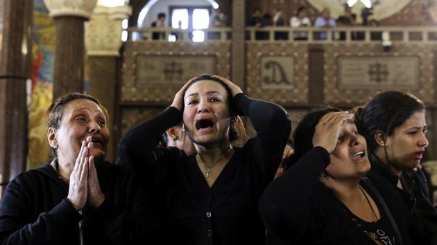 Women cry during the funeral for those killed in a Palm Sunday church attack in Alexandria Egypt, at the Mar Amina church.(AP File Photo)
