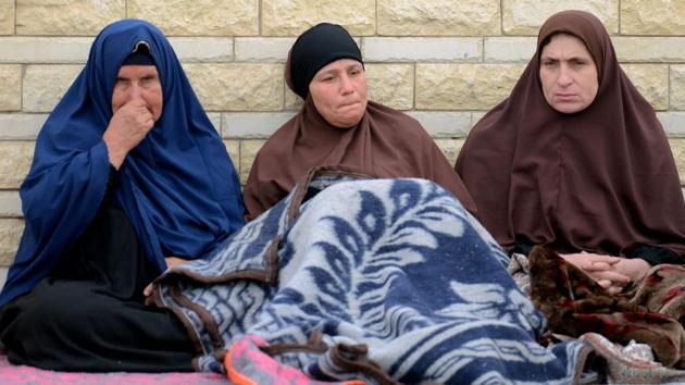 Relatives of the victims of the bomb and gun assault on the North Sinai Rawda mosque sit outside the Suez Canal University hospital in the eastern port city of Ismailia on November 25, 2017, where they were taken to receive treatment following the deadly attack the day before. (AFP Photo) Relatives of the victims of the bomb and gun assault on the North Sinai Rawda mosque sit outside the Suez Canal University hospital in the eastern port city of Ismailia on November 25, 2017, where they were taken to receive treatment following the deadly attack the day before. (AFP Photo)